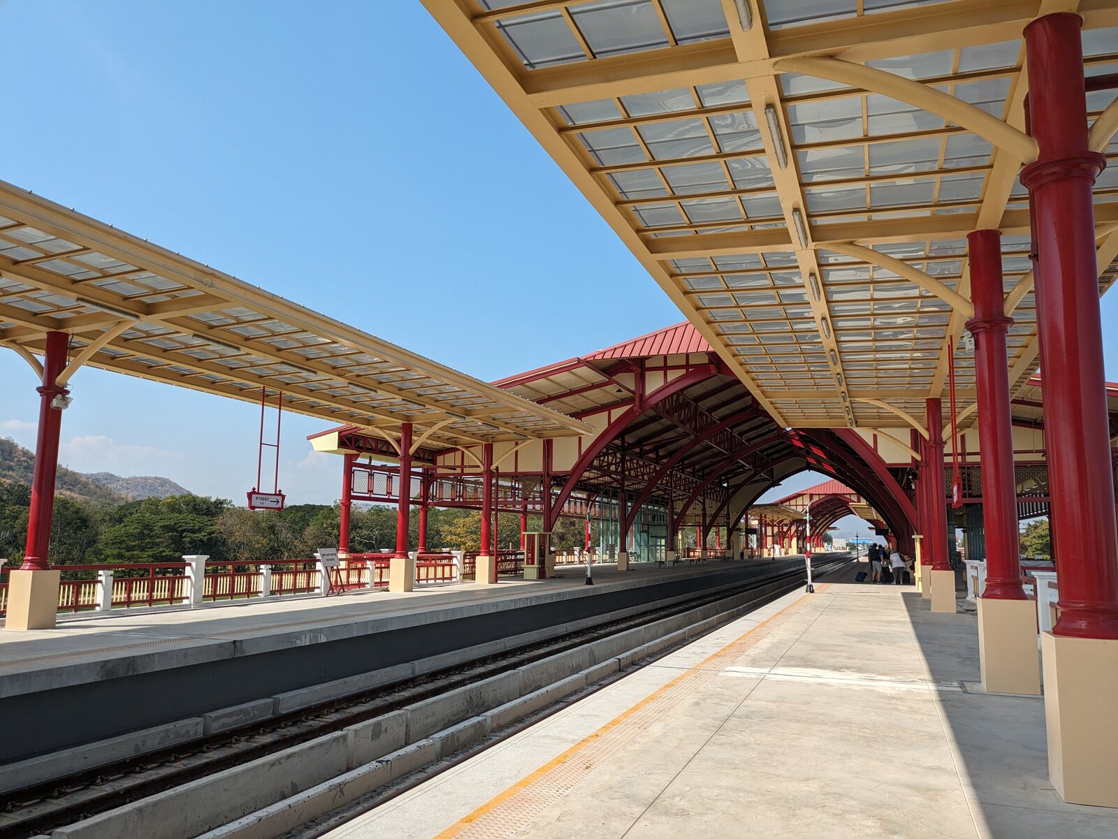 Hua Hin's royal railway pavilion, red and cream under its fretted roof